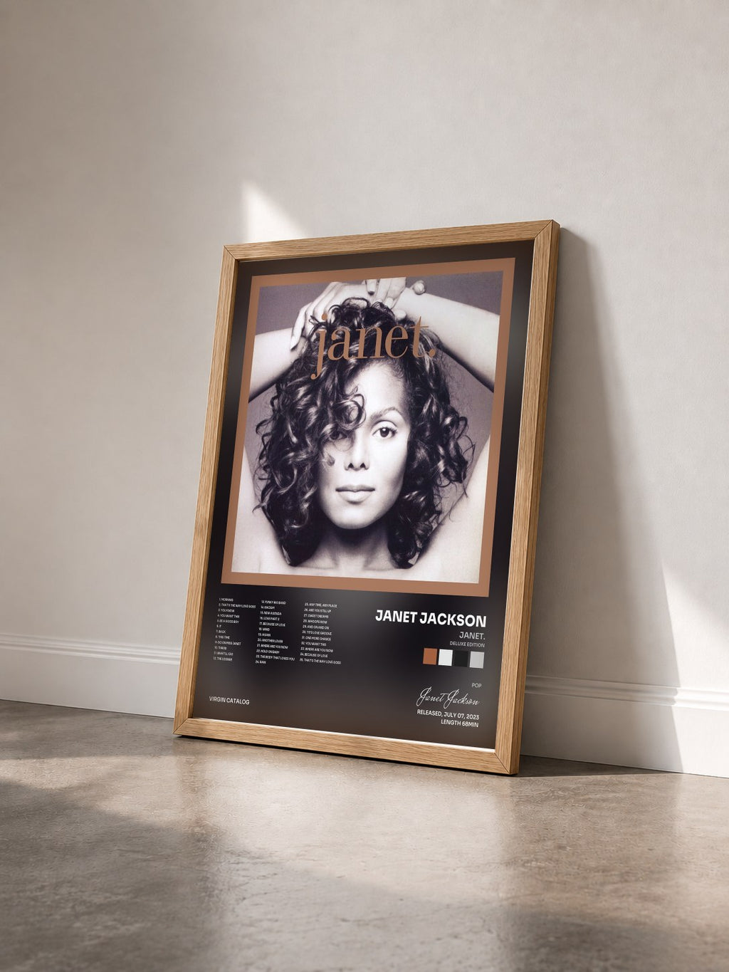 #bois Tableau de l'album janet. (Deluxe Edition) de Janet Jackson vu de trois quarts, cadre en bois brut