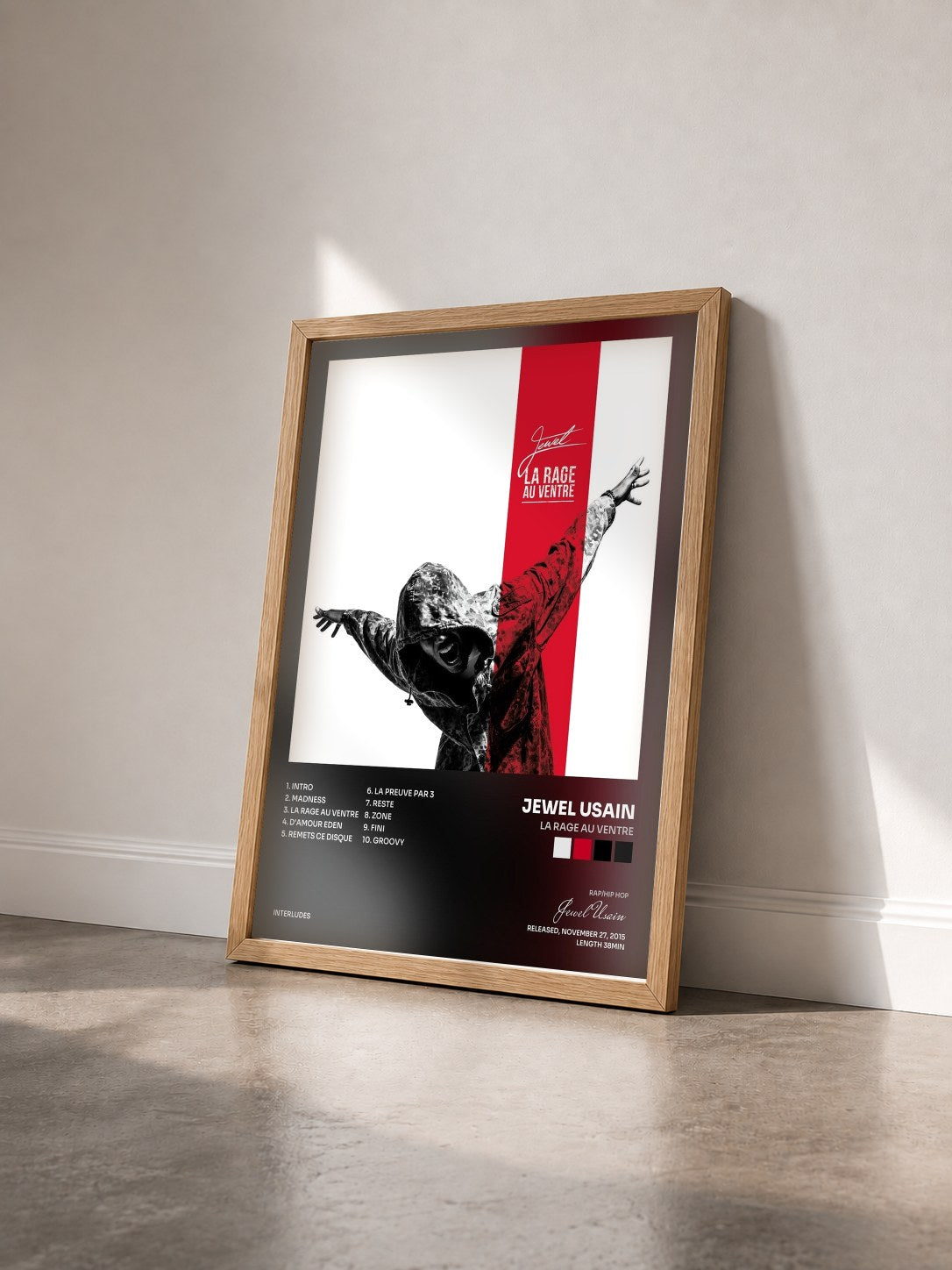 #bois Tableau de l'album La rage au ventre de Jewel Usain vu de trois quarts, cadre en bois brut