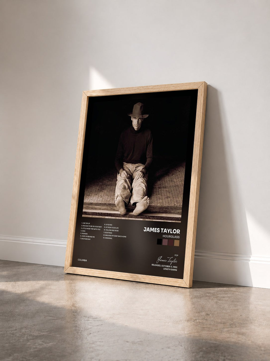 #bois Tableau de l'album Hourglass de James Taylor vu de trois quarts, cadre en bois brut