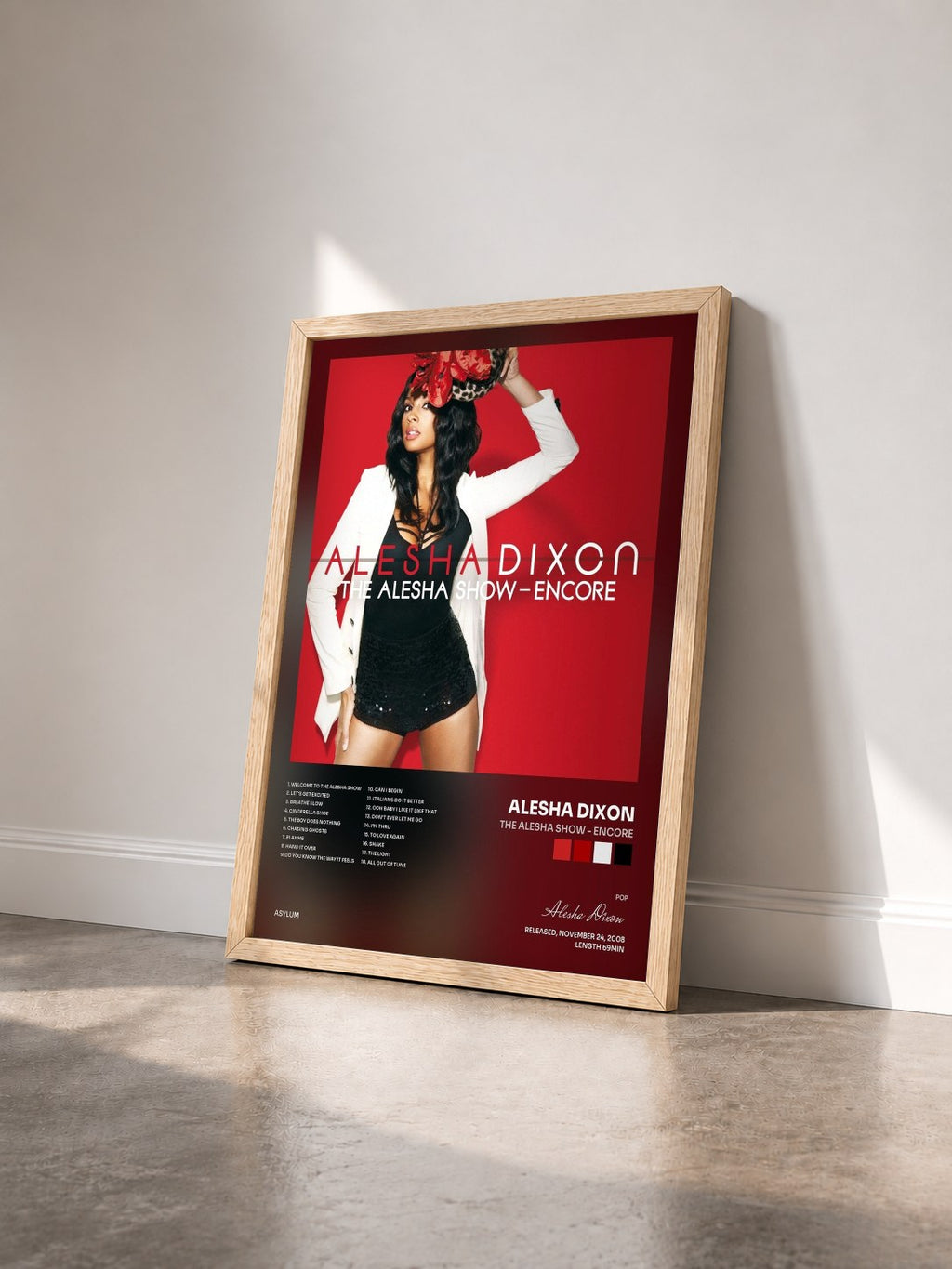 #bois Tableau de l'album The Alesha Show - Encore de Alesha Dixon vu de trois quarts, cadre en bois brut