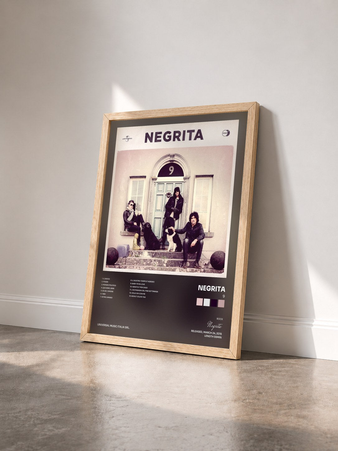 #bois Tableau de l'album 9 de Negrita vu de trois quarts, cadre en bois brut