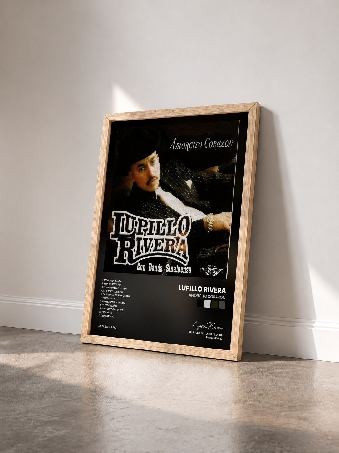 #bois Tableau de l'album Amorcito Corazon de Lupillo Rivera vu de trois quarts, cadre en bois brut