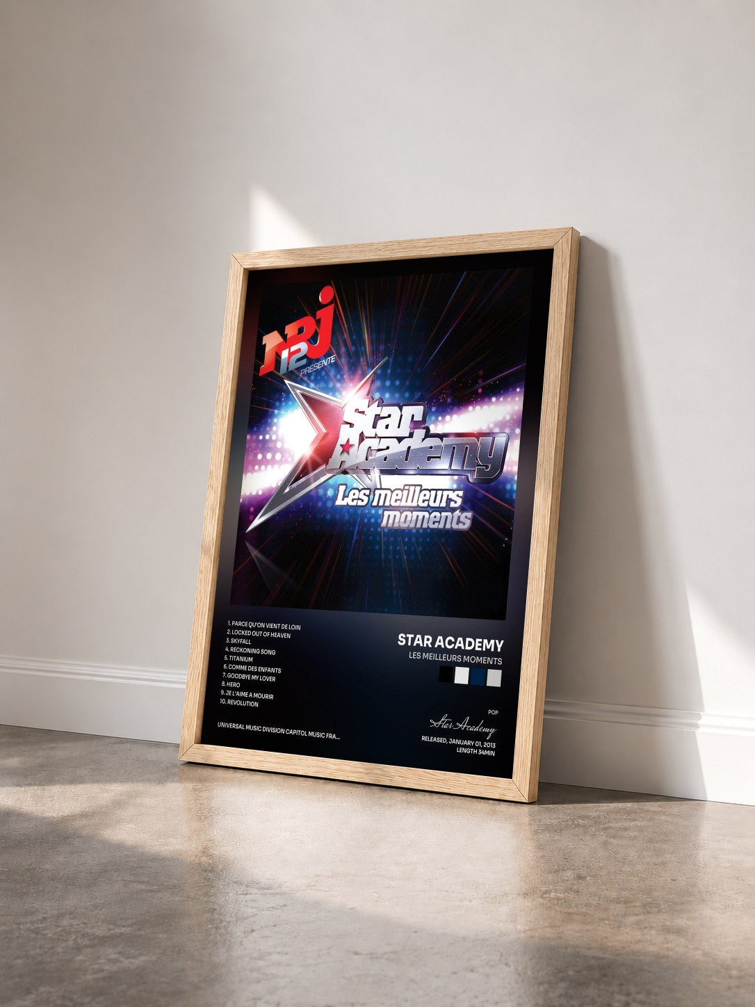 #bois Tableau de l'album Les Meilleurs Moments de Star Academy vu de trois quarts, cadre en bois brut