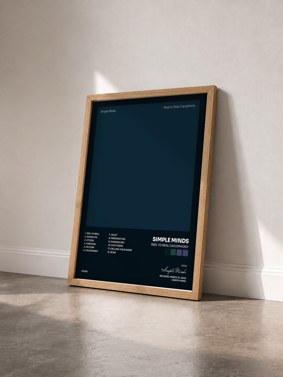 #bois Tableau de l'album Reel To Real Cacophony de Simple Minds vu de trois quarts, cadre en bois brut