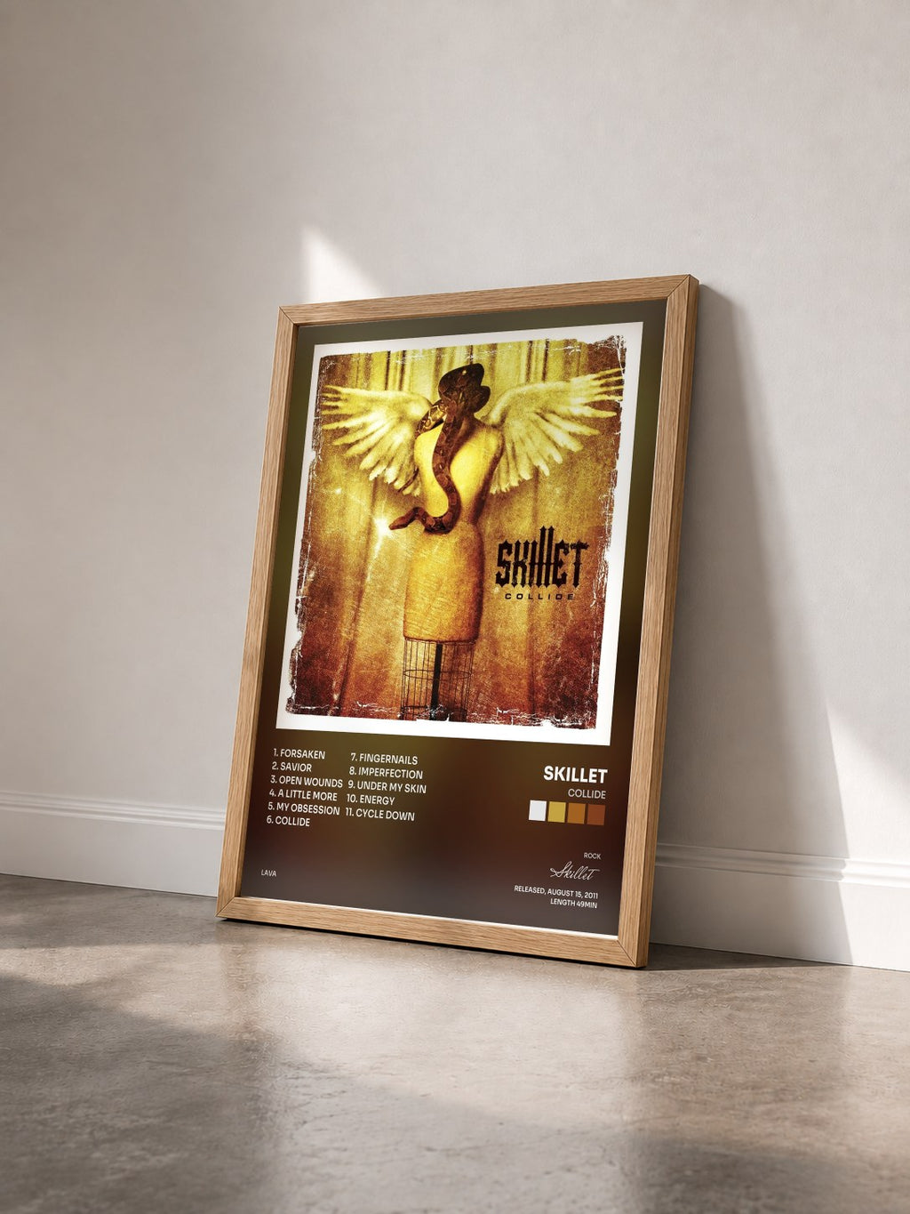 #bois Tableau de l'album Collide de Skillet vu de trois quarts, cadre en bois brut