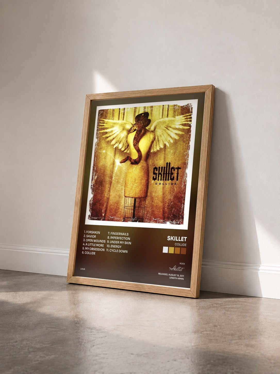 #bois Tableau de l'album Collide de Skillet vu de trois quarts, cadre en bois brut