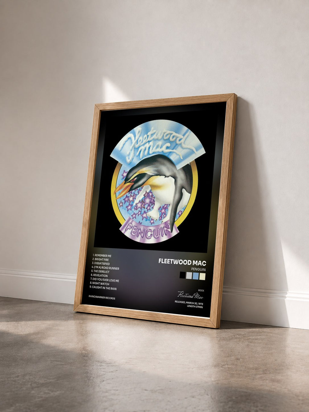 #bois Tableau de l'album Penguin de Fleetwood Mac vu de trois quarts, cadre en bois brut