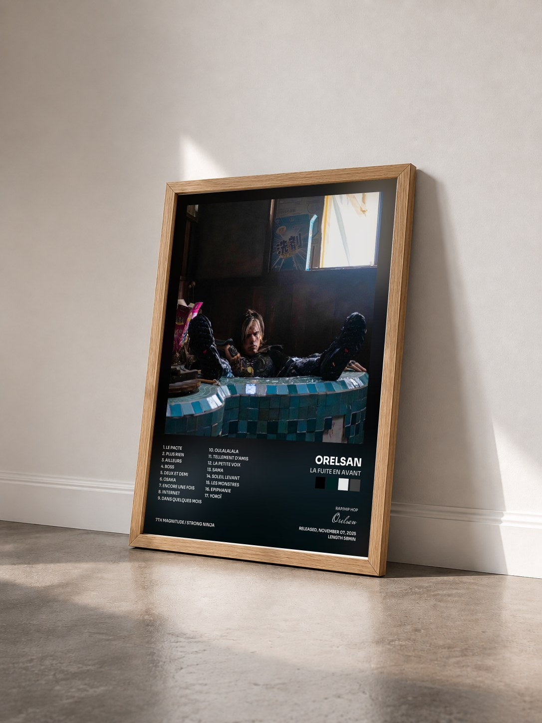 #bois Tableau de l'album La fuite en avant de Orelsan vu de trois quarts, cadre en bois brut