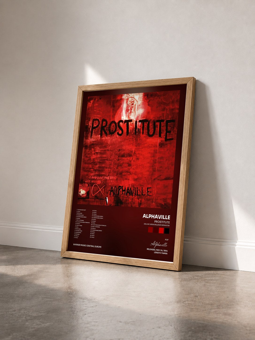 #bois Tableau de l'album Prostitute (Deluxe Version) (2023 Remaster) de Alphaville vu de trois quarts, cadre en bois brut