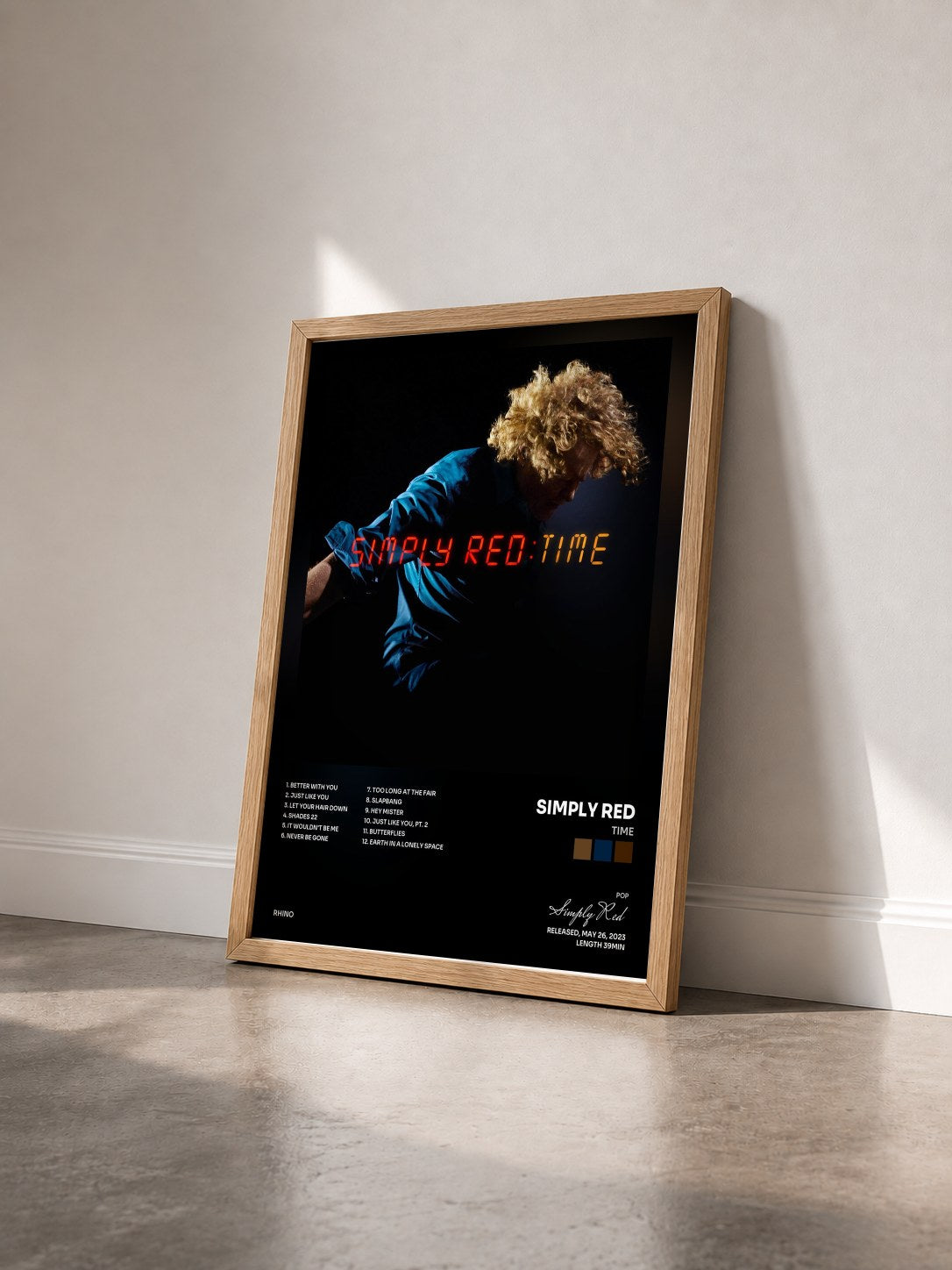 #bois Tableau de l'album Time de Simply Red vu de trois quarts, cadre en bois brut