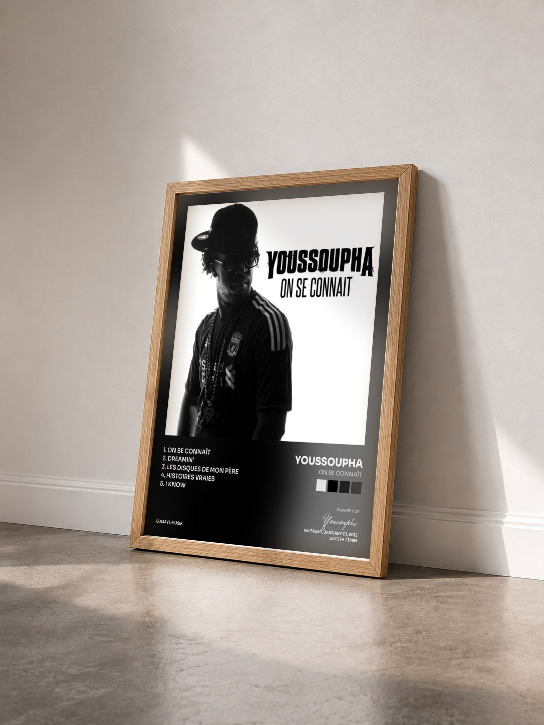 #bois Tableau de l'album On se connaît de Youssoupha vu de trois quarts, cadre en bois brut