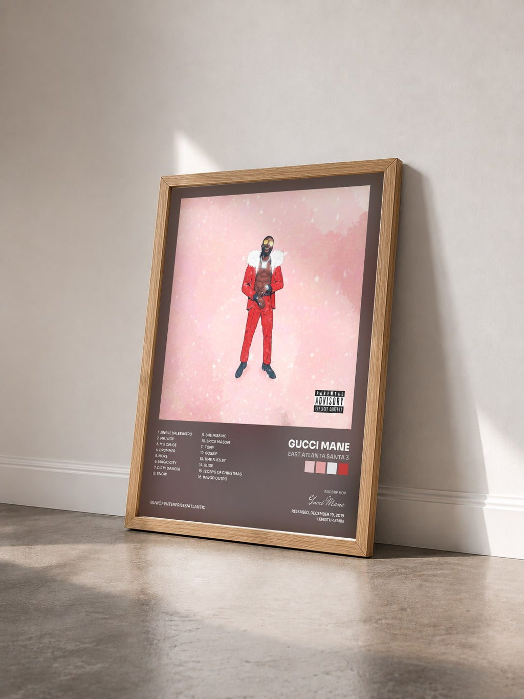 #bois Tableau de l'album East Atlanta Santa 3 de Gucci Mane vu de trois quarts, cadre en bois brut