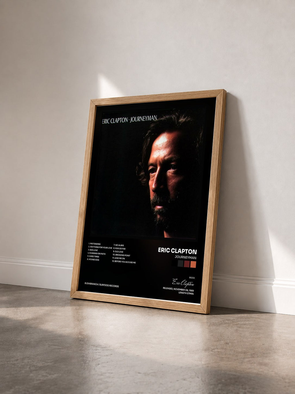 #bois Tableau de l'album Journeyman de Eric Clapton vu de trois quarts, cadre en bois brut
