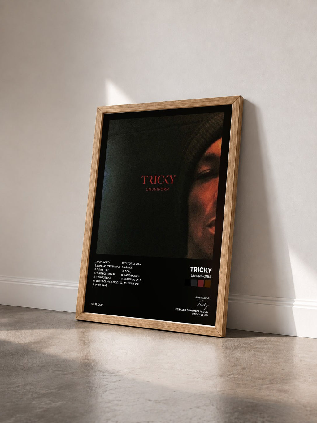 #bois Tableau de l'album ununiform de Tricky vu de trois quarts, cadre en bois brut