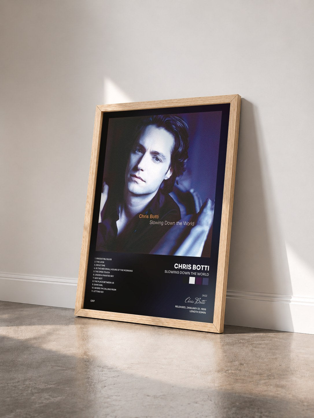 #bois Tableau de l'album Slowing Down The World de Chris Botti vu de trois quarts, cadre en bois brut