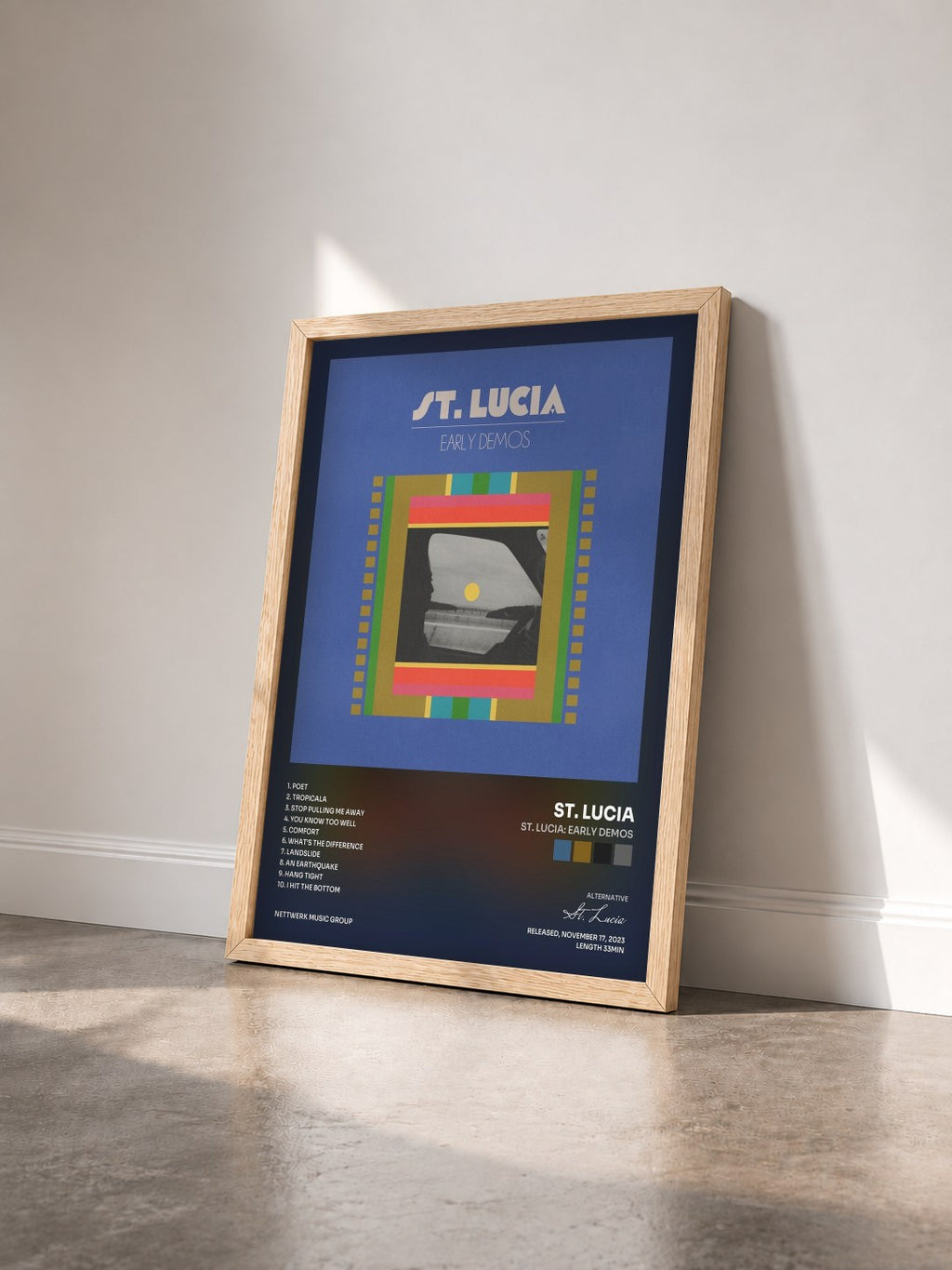 #bois Tableau de l'album St. Lucia: Early Demos de St. Lucia vu de trois quarts, cadre en bois brut