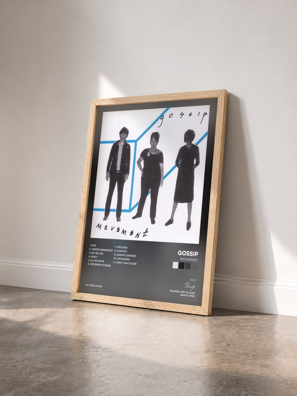 #bois Tableau de l'album Movement de Gossip vu de trois quarts, cadre en bois brut