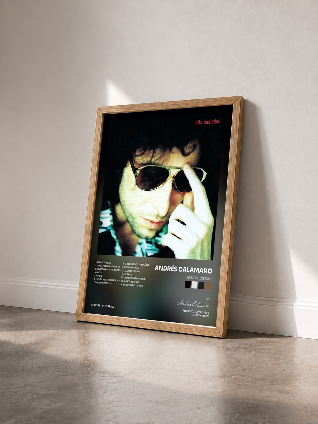 #bois Tableau de l'album Alta Suciedad de Andrés Calamaro vu de trois quarts, cadre en bois brut