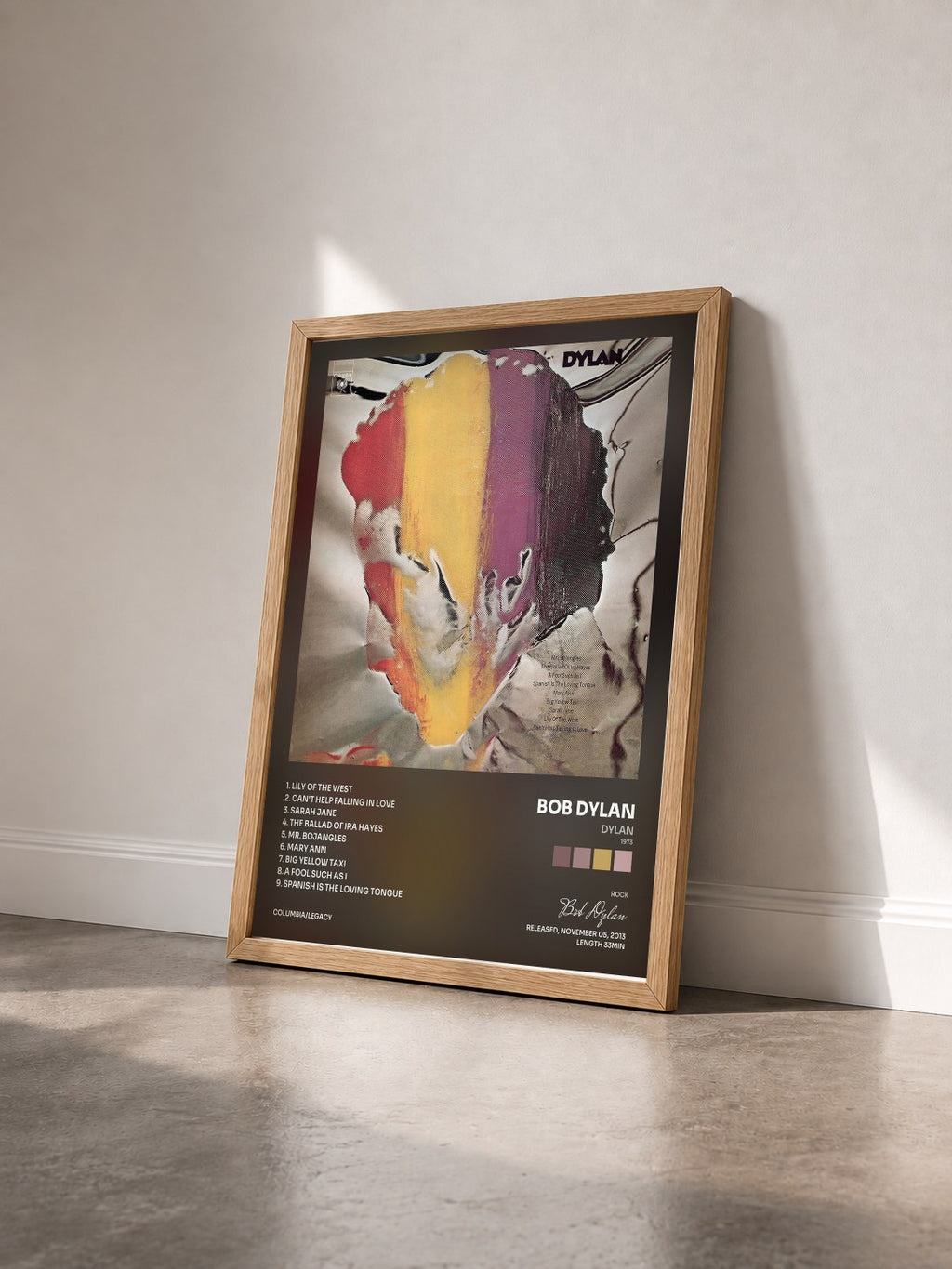 #bois Tableau de l'album Dylan (1973) de Bob Dylan vu de trois quarts, cadre en bois brut
