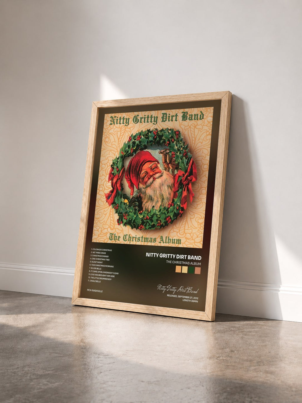 #bois Tableau de l'album The Christmas Album de Nitty Gritty Dirt Band vu de trois quarts, cadre en bois brut