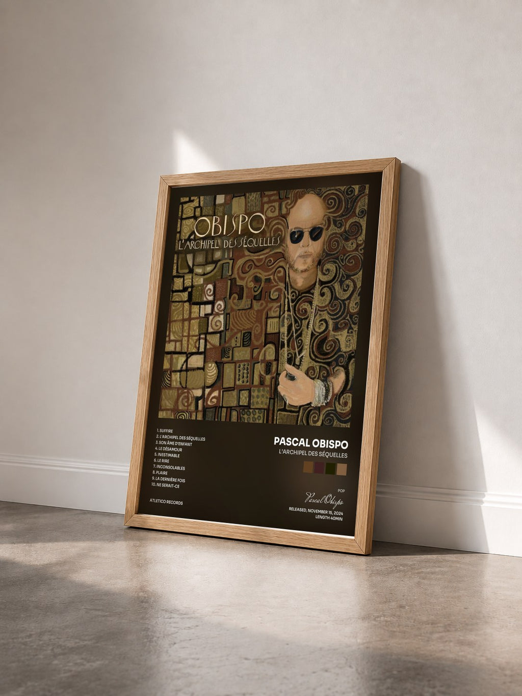 #bois Tableau de l'album L'archipel des séquelles de Pascal Obispo vu de trois quarts, cadre en bois brut