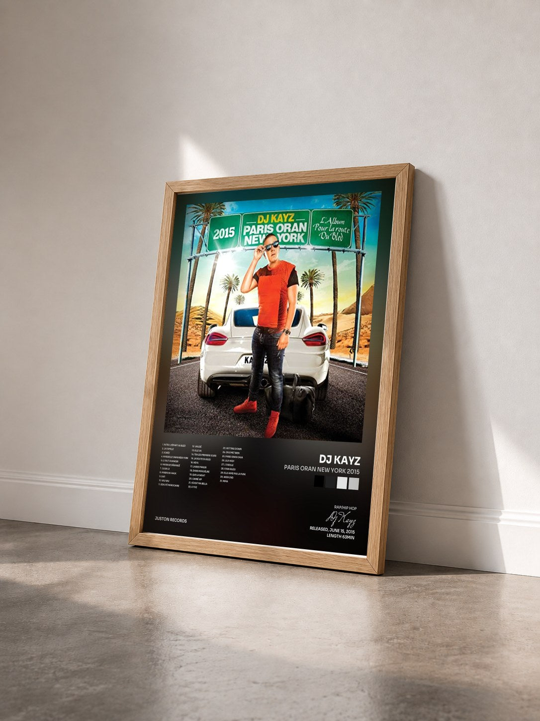 #bois Tableau de l'album Paris Oran New York 2015 de Dj Kayz vu de trois quarts, cadre en bois brut