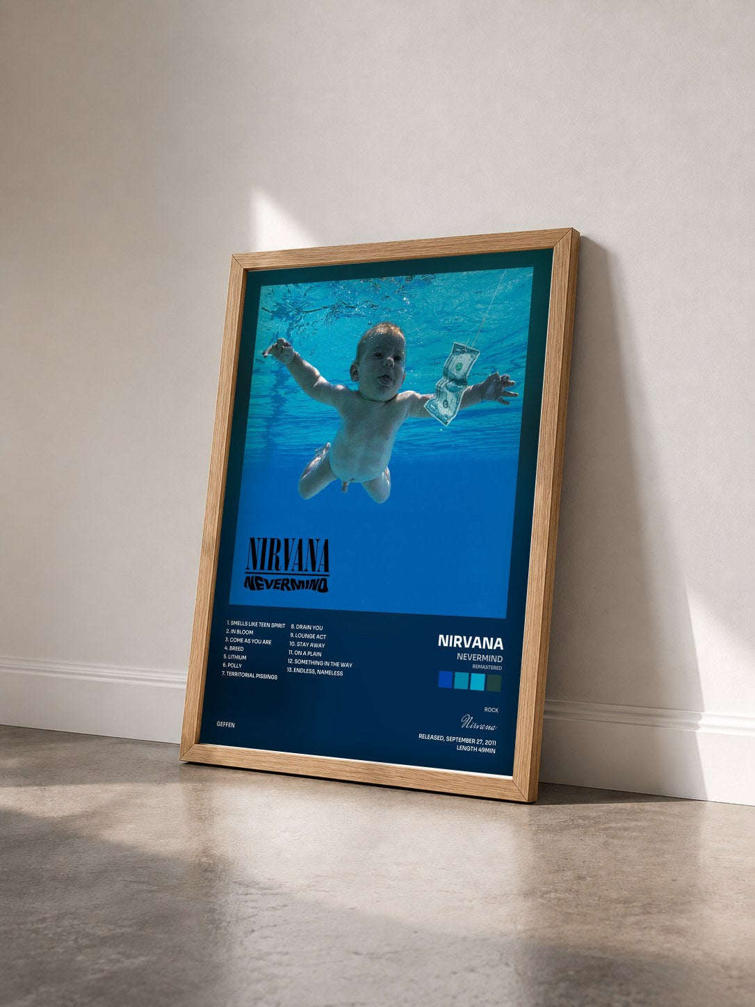 #bois Tableau de l'album Nevermind (Remastered) de Nirvana vu de trois quarts, cadre en bois brut