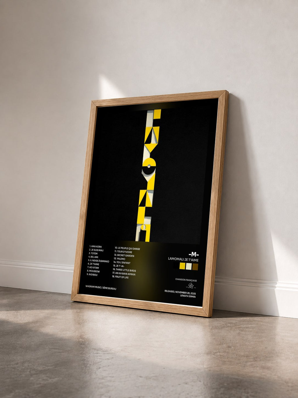#bois Tableau de l'album Lamomali Je t'aime de -M- vu de trois quarts, cadre en bois brut