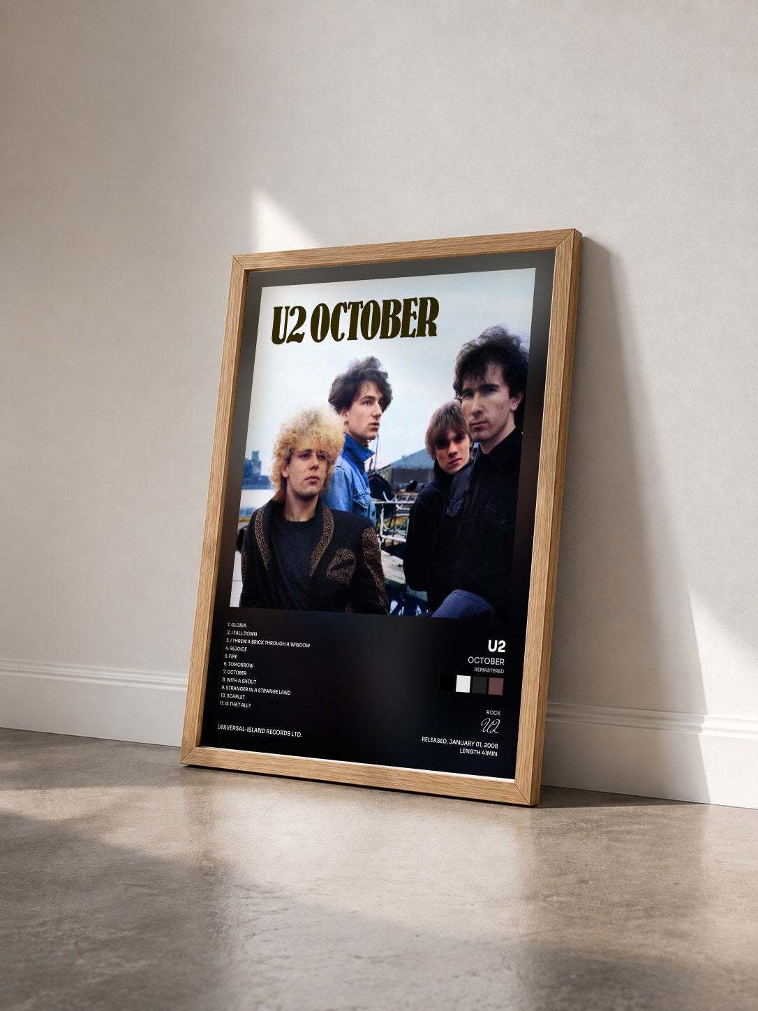 #bois Tableau de l'album October (Remastered) de U2 vu de trois quarts, cadre en bois brut