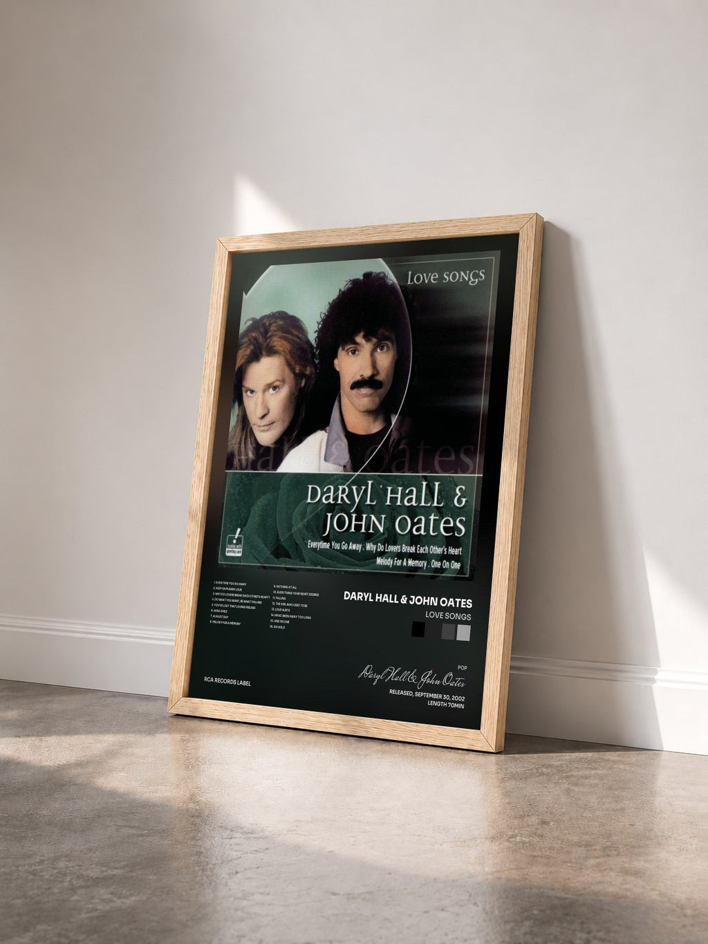 #bois Tableau de l'album Love Songs de Daryl Hall & John Oates vu de trois quarts, cadre en bois brut