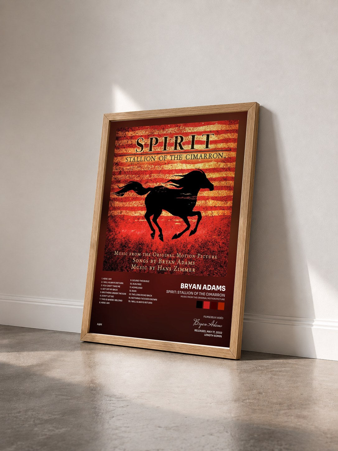 #bois Tableau de l'album Spirit: Stallion Of The Cimarron (Music From The Original Motion Picture) de Bryan Adams vu de trois quarts, cadre en bois brut