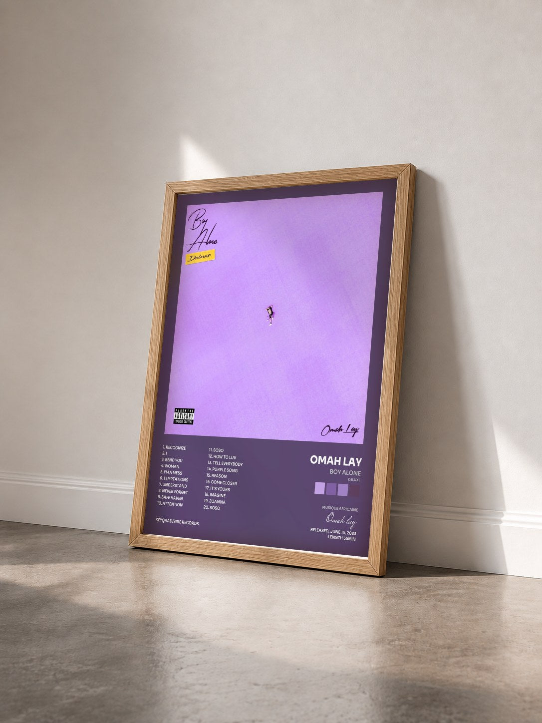 #bois Tableau de l'album Boy Alone (Deluxe) de Omah lay vu de trois quarts, cadre en bois brut