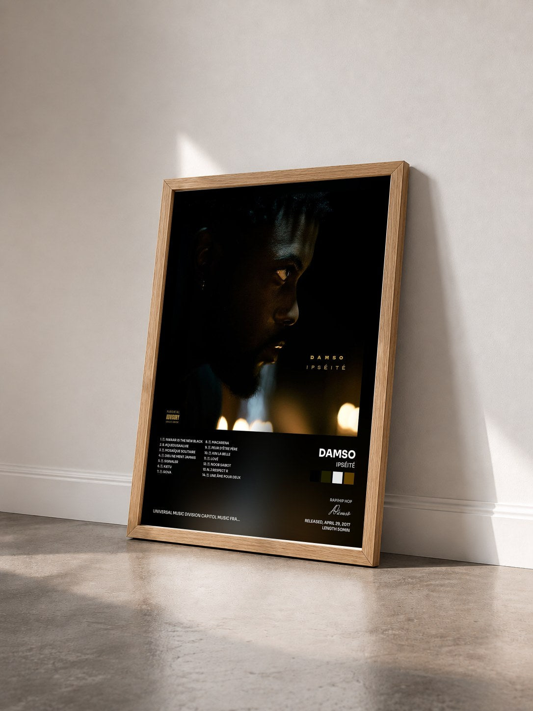 #bois Tableau de l'album Ipséité de Damso vu de trois quarts, cadre en bois brut