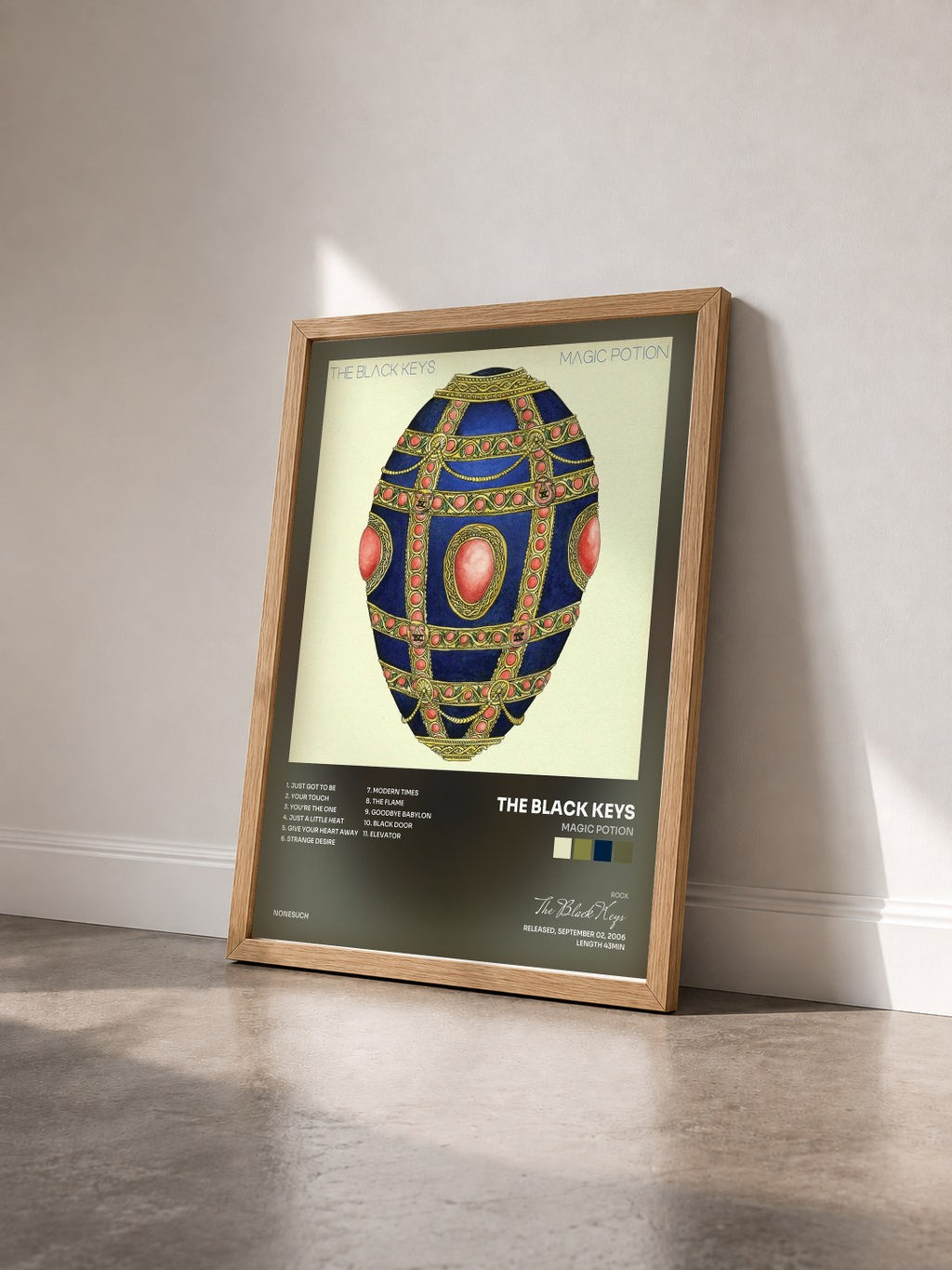 #bois Tableau de l'album Magic Potion de The Black Keys vu de trois quarts, cadre en bois brut