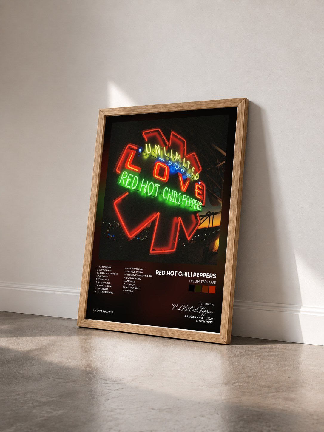 #bois Tableau de l'album Unlimited Love de Red Hot Chili Peppers vu de trois quarts, cadre en bois brut