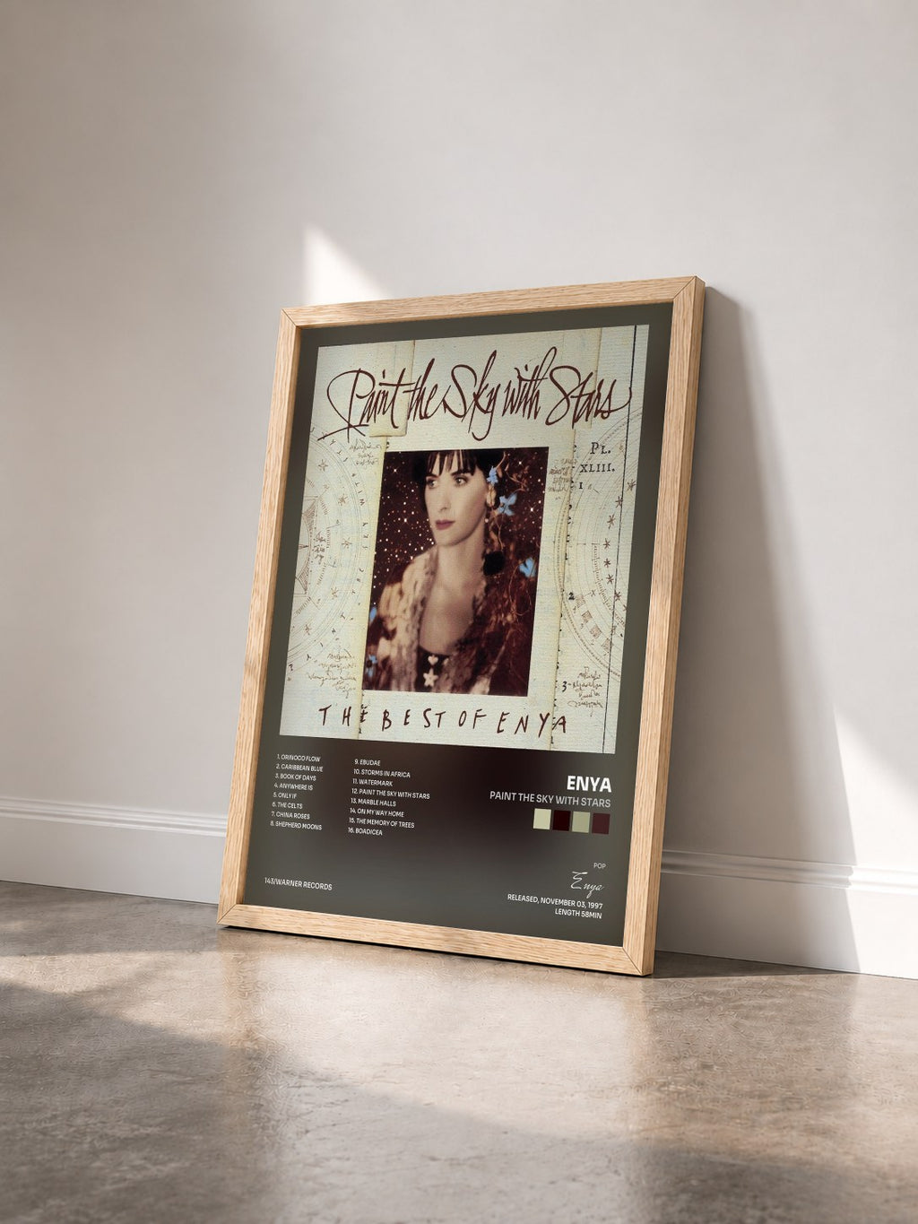 #bois Tableau de l'album Paint the Sky with Stars de Enya vu de trois quarts, cadre en bois brut