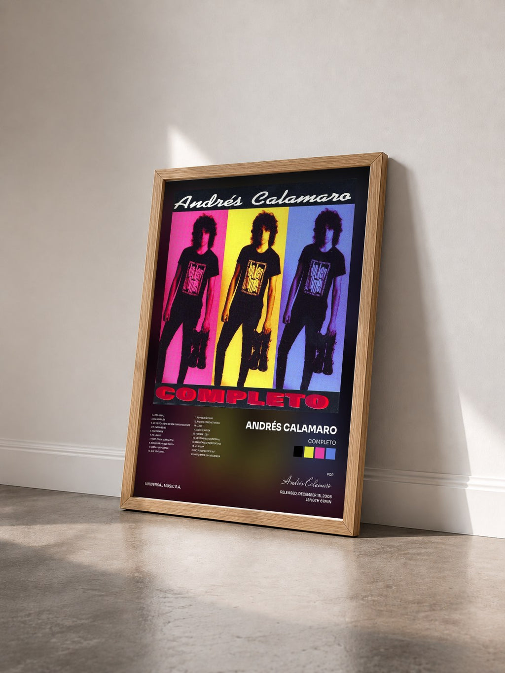 #bois Tableau de l'album Completo de Andrés Calamaro vu de trois quarts, cadre en bois brut