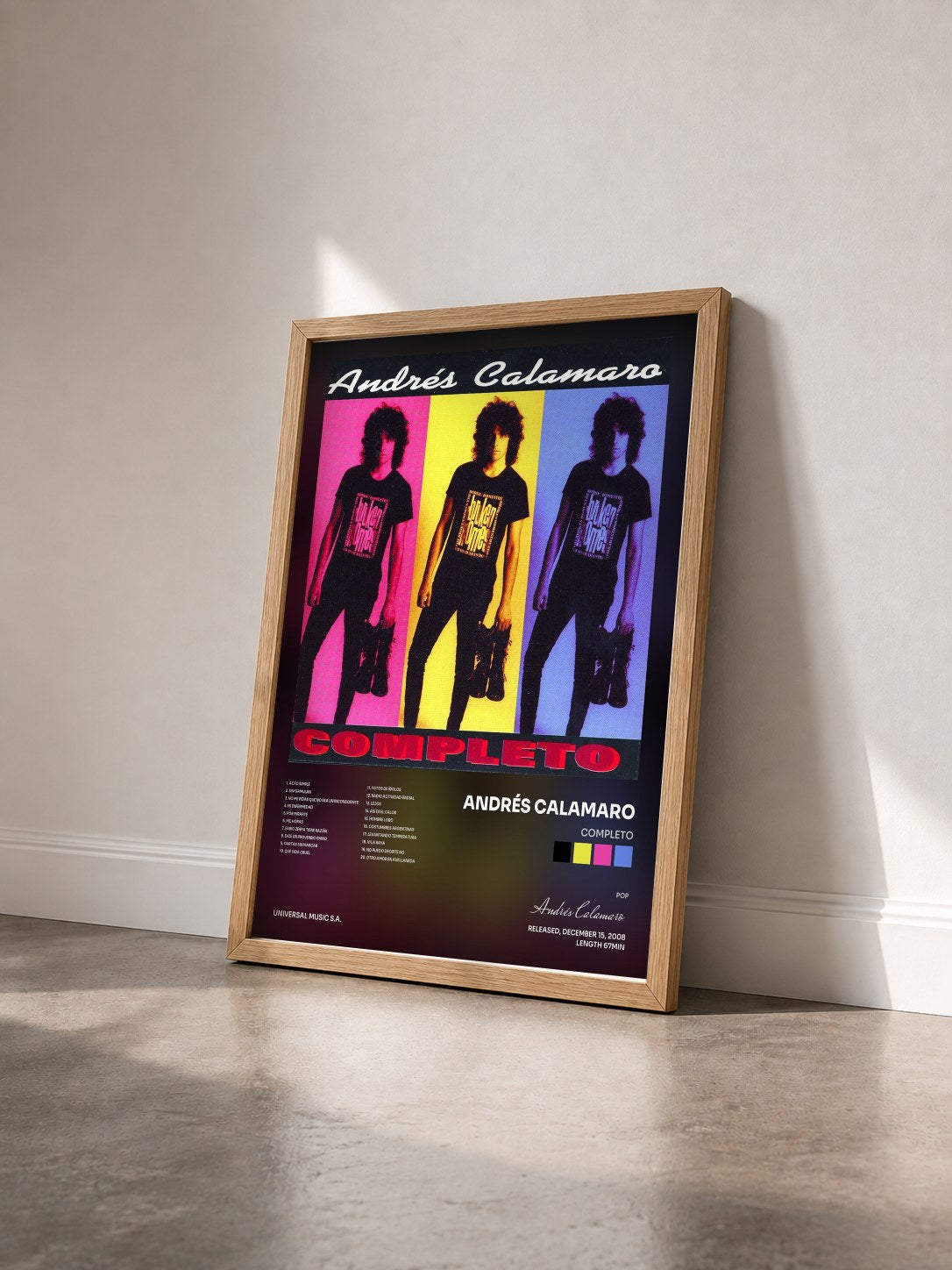 #bois Tableau de l'album Completo de Andrés Calamaro vu de trois quarts, cadre en bois brut