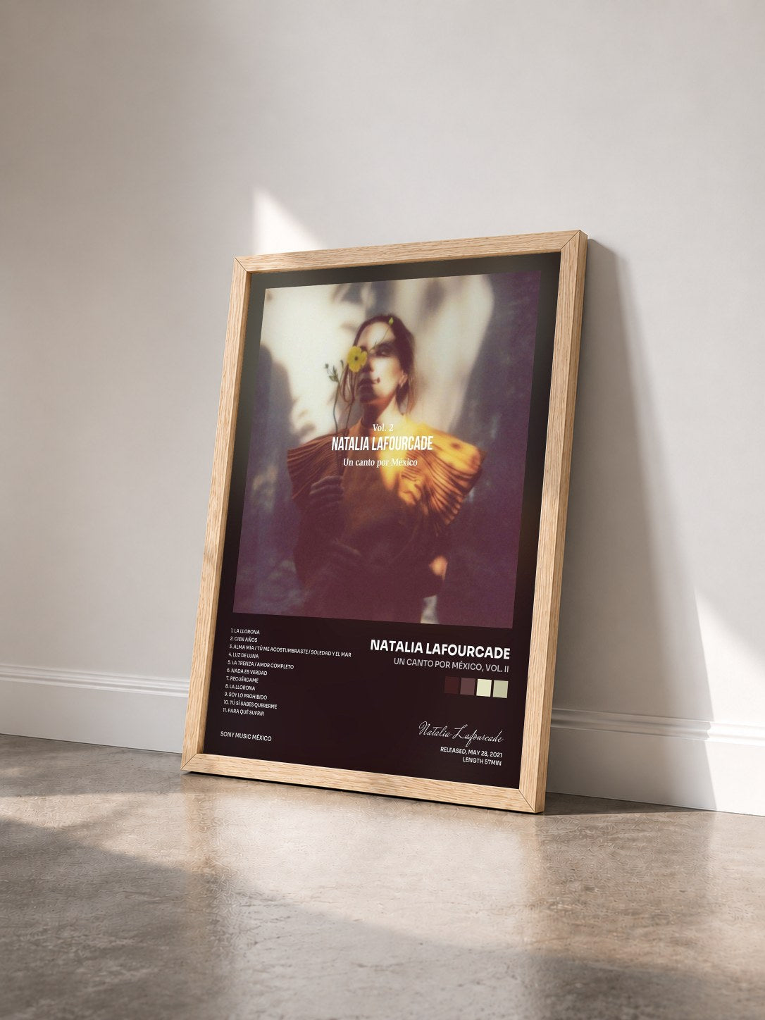 #bois Tableau de l'album Un Canto por México, Vol. II de Natalia Lafourcade vu de trois quarts, cadre en bois brut
