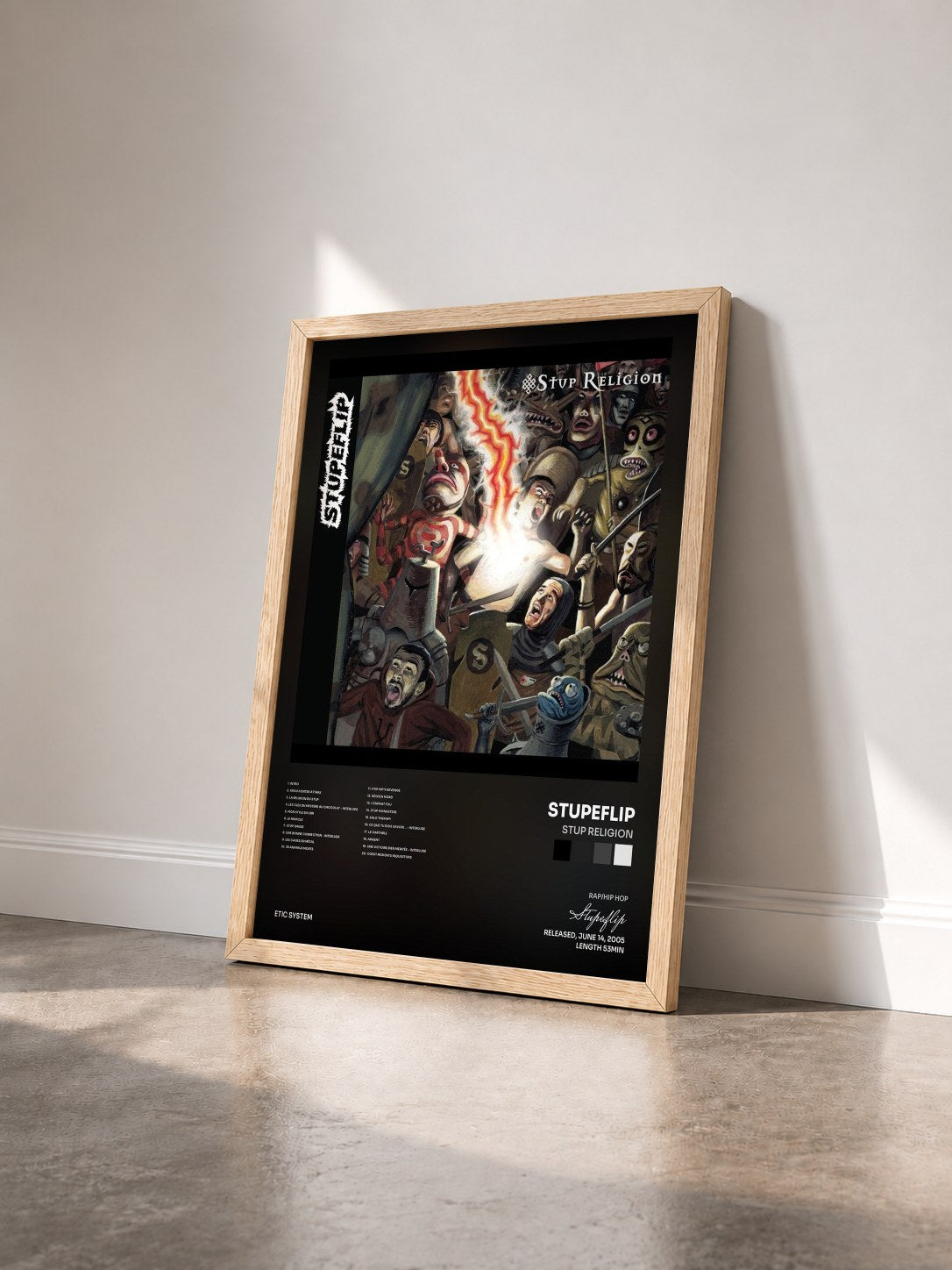 #bois Tableau de l'album Stup Religion de Stupeflip vu de trois quarts, cadre en bois brut