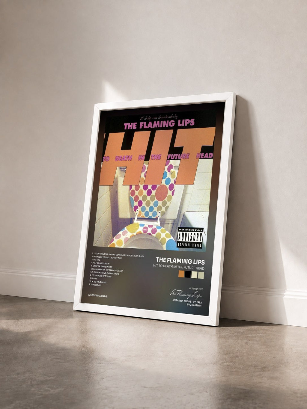 #blanc Tableau de l'album Hit to Death in the Future Head de The Flaming Lips vu de trois quarts, cadre blanc