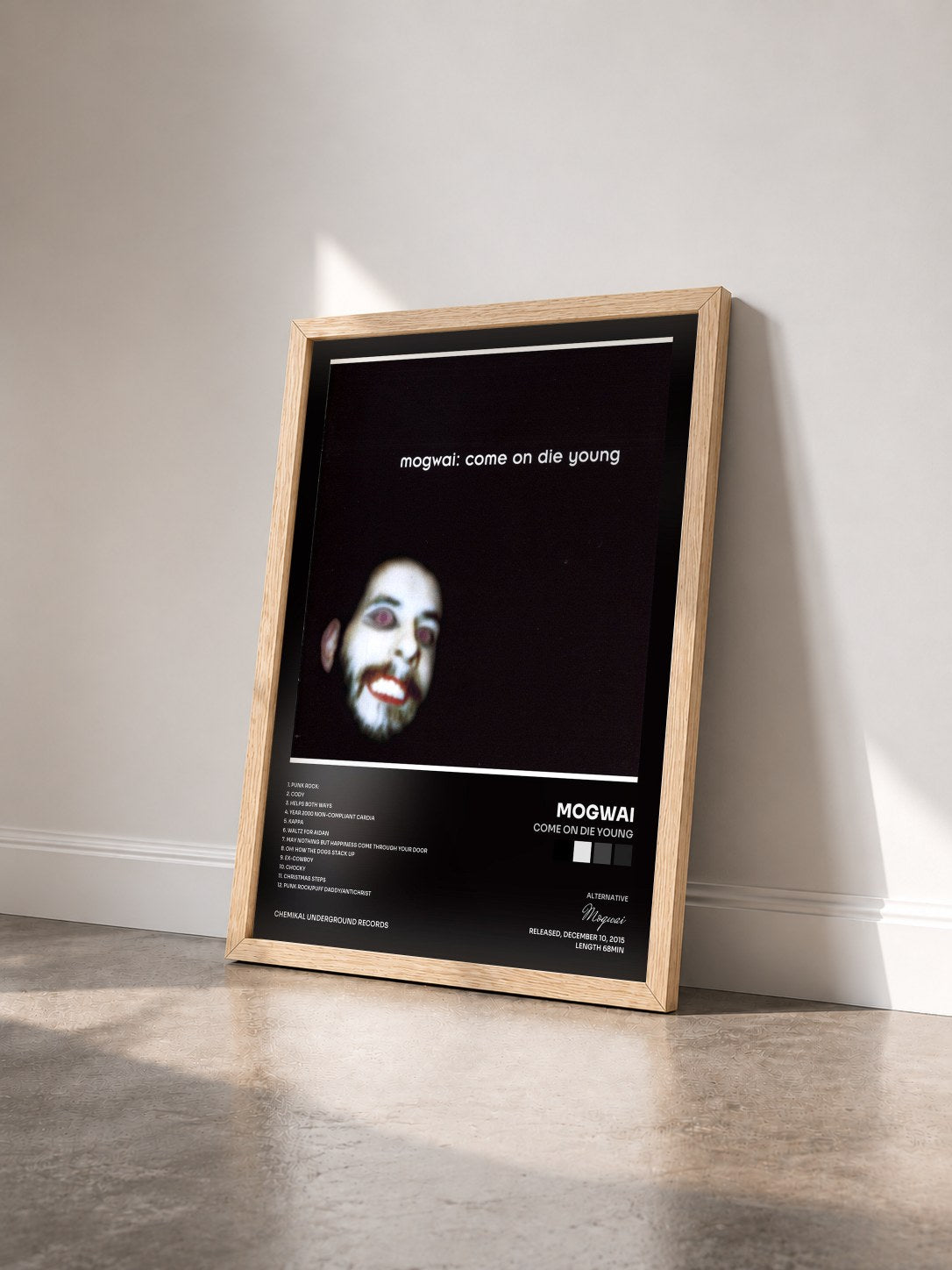 #bois Tableau de l'album Come on Die Young de Mogwai vu de trois quarts, cadre en bois brut