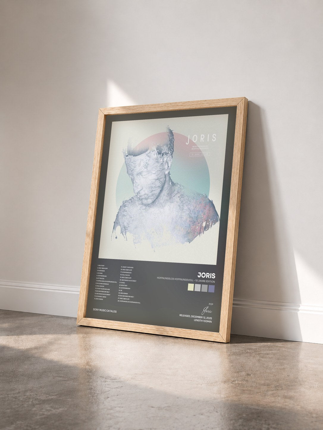 #bois Tableau de l'album Hoffnungslos Hoffnungsvoll - 10 Jahre Edition de Joris vu de trois quarts, cadre en bois brut