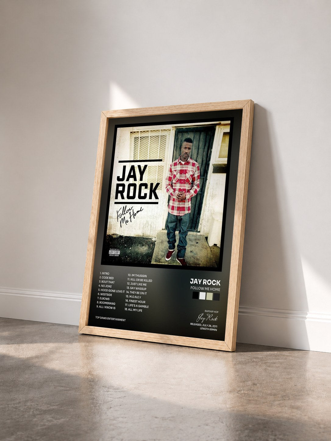 #bois Tableau de l'album Follow Me Home de Jay Rock vu de trois quarts, cadre en bois brut