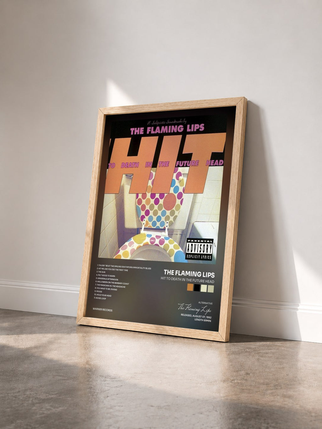 #bois Tableau de l'album Hit to Death in the Future Head de The Flaming Lips vu de trois quarts, cadre en bois brut