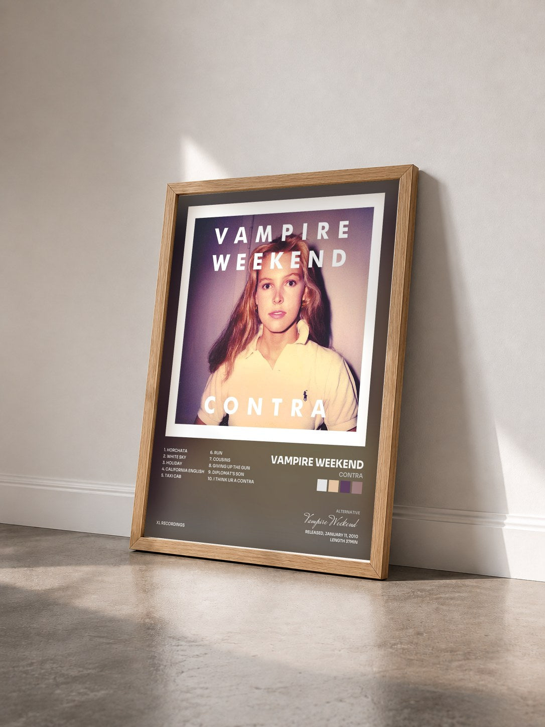 #bois Tableau de l'album Contra de Vampire Weekend vu de trois quarts, cadre en bois brut