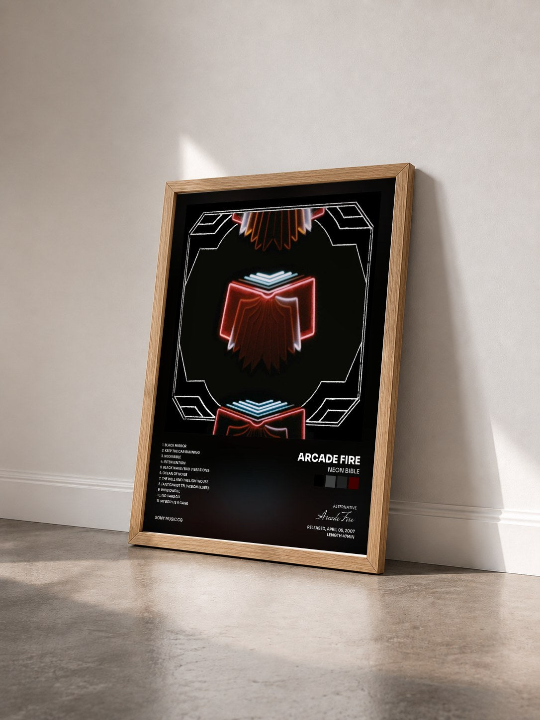 #bois Tableau de l'album Neon Bible de Arcade Fire vu de trois quarts, cadre en bois brut