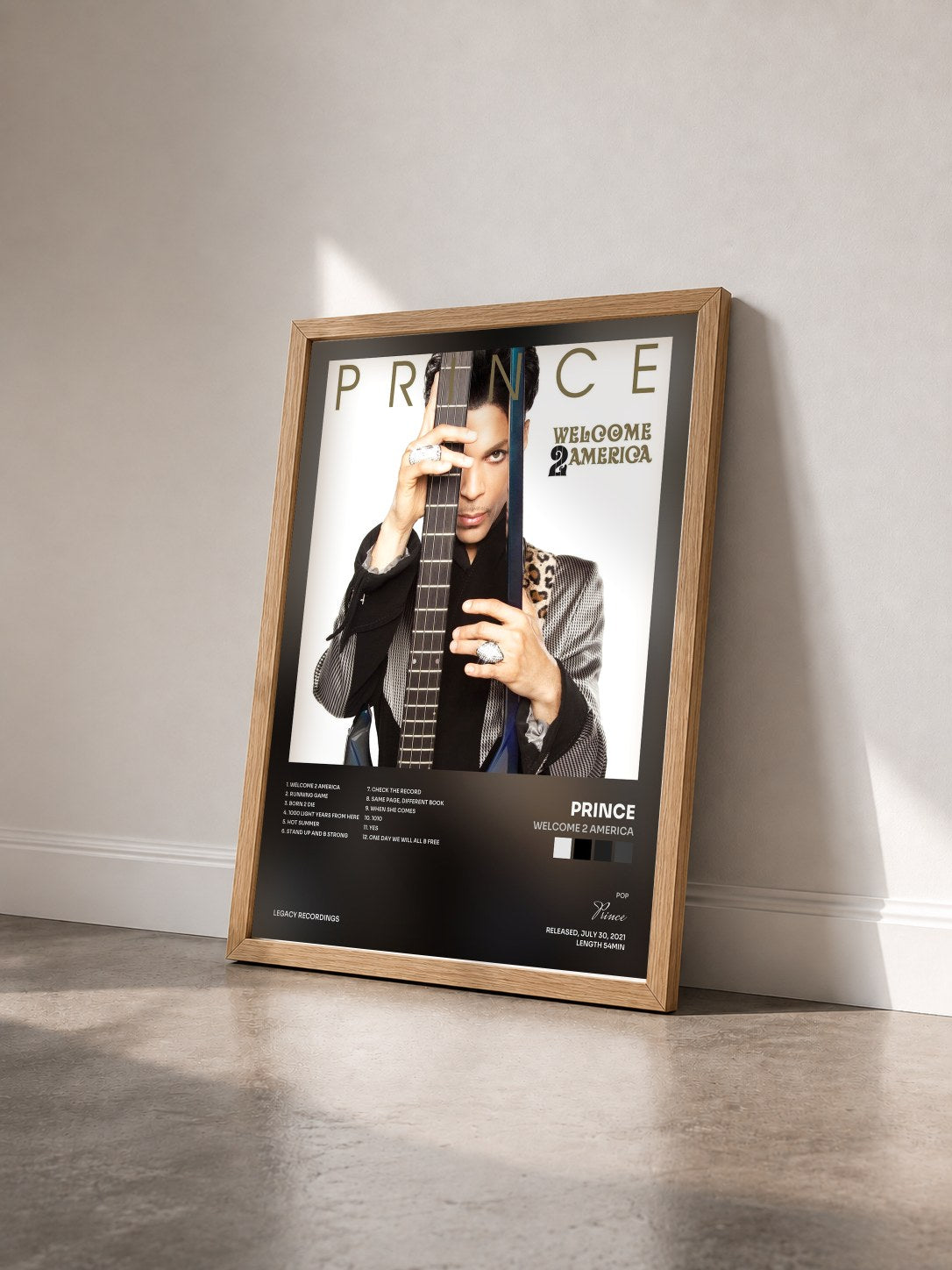#bois Tableau de l'album Welcome 2 America de Prince vu de trois quarts, cadre en bois brut
