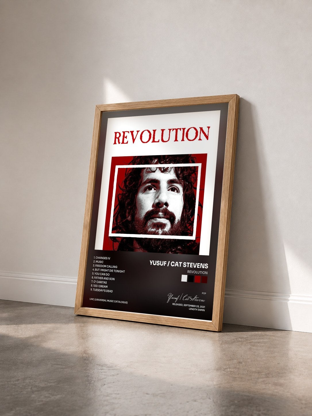 #bois Tableau de l'album REVOLUTION de Yusuf / Cat Stevens vu de trois quarts, cadre en bois brut