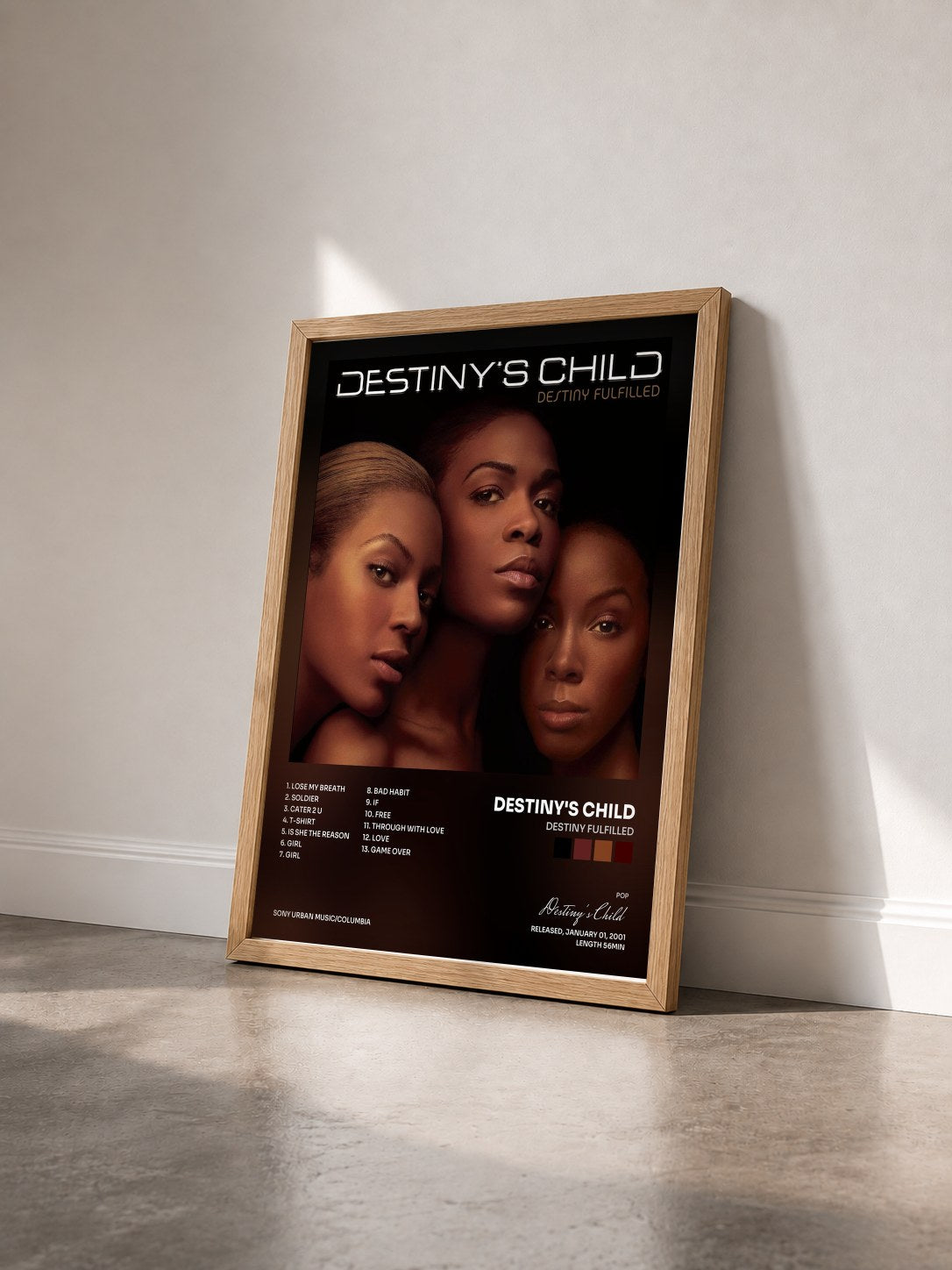 #bois Tableau de l'album Destiny Fulfilled de Destiny's Child vu de trois quarts, cadre en bois brut